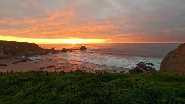 Sunset at the Zambujeira do Mar beach, Alentejo, Portugal. Portugal Hiking Rota Vicentina the Fisherman's Trail Along the Alentejo Coastline to Wild and Rugged Beaches Narrow Cliff Side Paths.