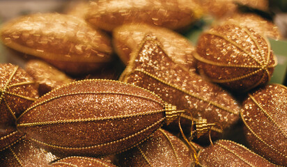golden shiny christmas decorations for the christmas tree