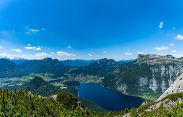 Stunning aerial panorama view of Altaussee lake from Trisselwand with the peak Loser on a sunny summer day, Styria, Austria - 688823485