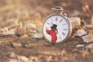 surreal woman dressed in red runs inside a clock, time concept