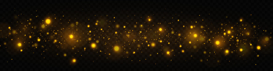 Fototapeta na wymiar Golden shimmering background with light effect. The dust sparks and golden stars shine with special light on a transparent background. Christmas concept.