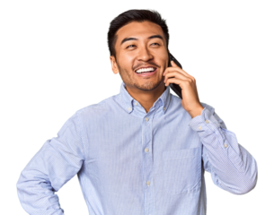 Chinese man engaged in a phone conversation in studio background