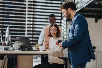 Diverse business team strategizing for sustainable global expansion through e-commerce and technology.