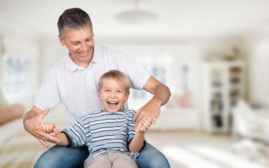 Playful father have fun with son in park
