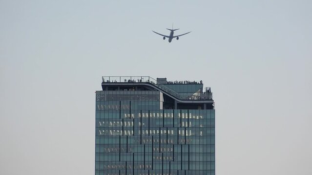 SHIBUYA, TOKYO, JAPAN -NOV 2023 : Close up shot of Shibuya sky building in sunset. A large complex facility has 47 floors above the ground, 229m high. Japanese urban city and technology concept video.