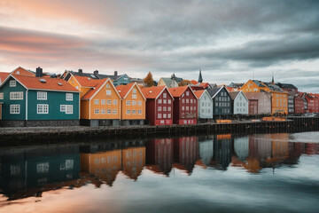Fototapeta na wymiar Colorful houses over water in Trondheim city - Norway