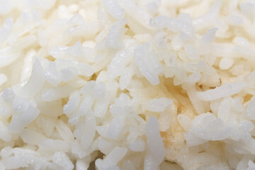 white rice background. close up of rice. close up of white rice. food with selective focus.
