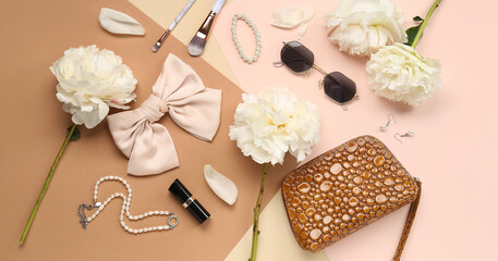 Composition with female accessories and beautiful peony flowers on color background