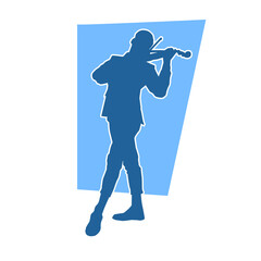 Silhouette of a male musician male playing violin musical instrument. Silhouette of a man violinist in action pose.