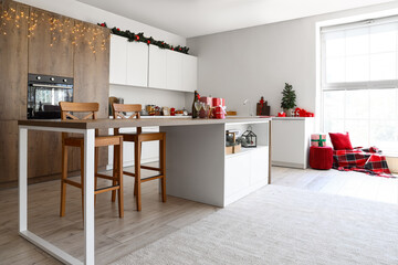 Interior of modern kitchen with Christmas decor