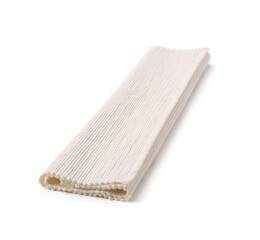 Folded fabric table mat on white background