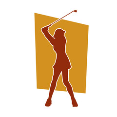 Silhouette of a woman playing golf. Silhouette of a female golfer in action pose.