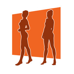 Silhouette of a slim female model wearing casual outfit standing in girly pose.