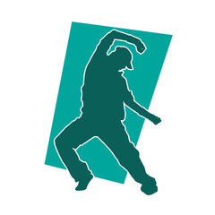 Fototapeta premium Silhouette of a male dancer in performing pose. Silhouette of a dancing man.