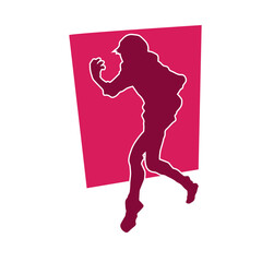 Silhouette of a slim female dance pose. Silhouette of a female in aerobic movement.