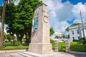 Fototapeta na wymiar Cenotaph on Front Street at Cabinet Building in historic commercial buildings in Hamilton city center in Bermuda. Hamilton is the capital of Bermuda. 