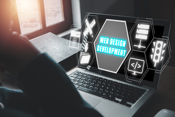 Web design development concept, Business person using laptop computer on office desk with web...
