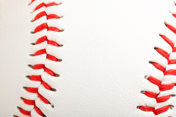 Baseball ball with stitches as background, closeup