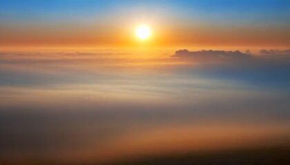 Obraz premium Sunrise seen over the sea of ​​clouds. mountain peak