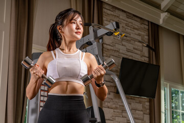 Obraz na płótnie Canvas Happy sport beautiful young asian woman exercise workout smile training at the gym fitness. athlete girl training strong and good health and strength.