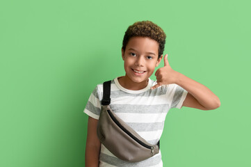 Little African-American boy showing 