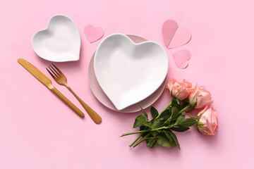 Beautiful table setting with roses for Valentine's Day on pink background - obrazy, fototapety, plakaty
