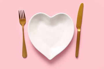 Beautiful table setting for Valentine's Day on pink background