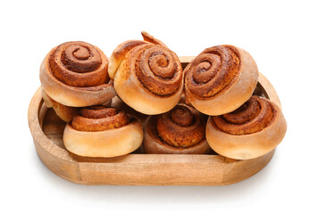 Wooden tray with tasty cinnamon rolls on white background