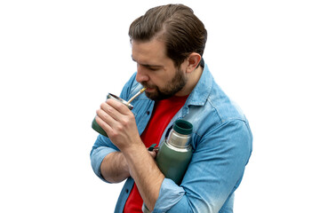 Young man drinking mate with his arms crossed.