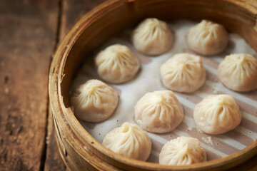 Dumplings in a wooden steamer