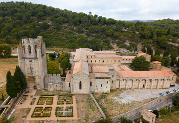 Aerial view of medieval Benedictine monastic complex of Saint Mary in French commune of Lagrasse