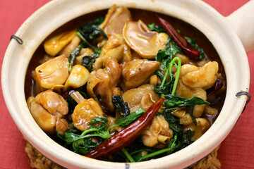 Taiwanese three-cup chicken ( San Bei Ji ) in a clay pot