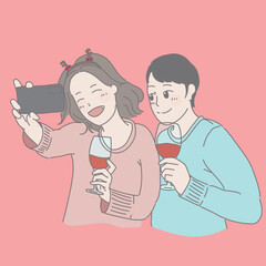 a couple taking a selfie with a bottle of wine