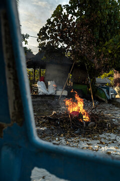 Burning garbage on the beach, Bali, indonesia, Asia