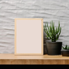 minimal wood picture frame on wooden shelf with plant pot
