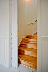 A double door was installed inside the house to hide the stairs