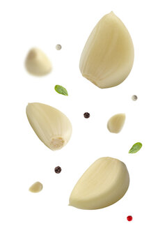 Falling peeled garlic cloves on transparent background png