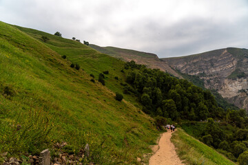 Caucasian mountain. Dagestan. Trees, rocks, mountains, view of the green mountains. Beautiful summer landscape.