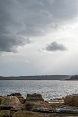 flat rocky coastline by the ocean in tasmania australia