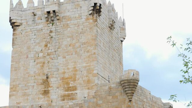 Tilt up along castle tower parapet in Chaves Vila Real Portugal