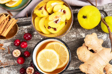 Hot drinks with honey, lemon and ginger for remedy.