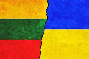 Ukraine and Lithuania painted flags on a wall with a crack. Ukraine and Lithuania relations. Lithuania and Ukraine flags together