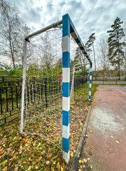 Football goal in nature in autumn