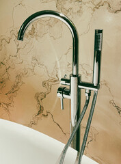 Metal faucet substitute on the bathroom