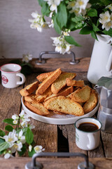 Biscotti on a wooden board, top view.