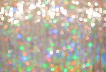 Blurred large round bokeh highlights of New Year tinsel....