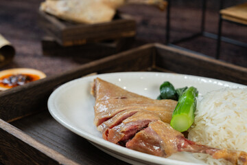 Cured duck leg with rice