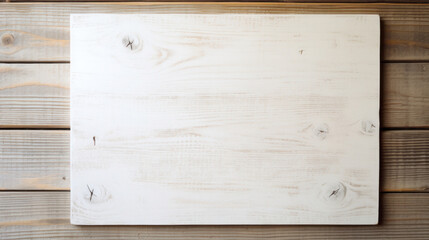 Top view of white wooden cutting board on wooden background. Copy space