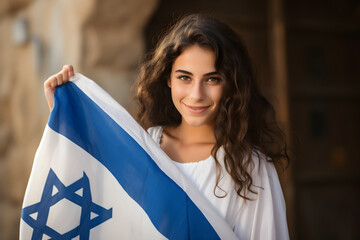 Patriotic jewish young girl with flag of Israel