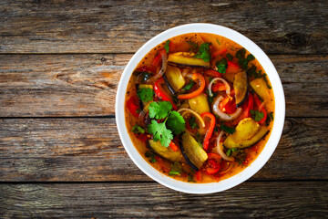 Vegetable soup on wooden table
